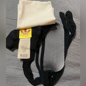 Gucci collab fish net tights